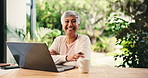 Mature woman, home patio and remote work with face, laptop and freelance online news editor. Happy, smile and newsletter update with arms crossed, entrepreneur and confidence for website research