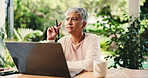 Mature woman, laptop and remote work from home with thinking, review or administration in morning. Person, virtual assistant and computer with solution, decision and confused  with typing at house