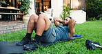 Outdoor, man and workout with crunches for fitness, endurance or strengthen core muscle in home. Backyard, male person and athlete with sit ups for exercise, abs development or breathing for wellness