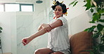 Skincare, home and woman with body cream for beauty, shine and glow. Bathroom, apply lotion and happy girl with cosmetics on arm for hydration, moisturizer or sunscreen for dermatology with self care