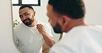 Happy man, mirror and bathroom with beard for grooming, morning routine or skincare at home. Male person, reflection and smile with clean shave for hygiene, fresh cut or facial treatment at house