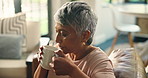 Home, drinking coffee and senior woman relax for peace, calm and thinking in retirement. Living room, tea cup and elderly person with hot beverage, latte and blow steam with espresso for aroma
