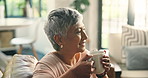 Home, coffee and senior woman with smell for peace, calm and thinking in retirement for relax. Living room, tea cup and aroma with happy person with hot drink, scent and blow steam with reflection