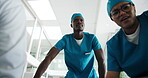 Emergency, doctors or push patient in hospital for surgery procedure, medical treatment or operation. POV, low angle and healthcare teamwork in ER to save victim, urgency and health service in clinic