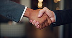Handshake, partnership and business people in office with deal, agreement or verbal contract. Greeting, welcome and financial manager shaking hands with investor for investment negotiation or trust.
