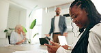 Woman, phone and typing in business meeting with laugh for distraction, message or social media. Female person, technology and online for funny meme, connection or scroll for joke on internet