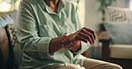Mature, woman and hand with wrist pain, muscle ache or tension for rheumatoid arthritis. Inflammation, osteoporosis or carpal tunnel syndrome with circulation issue, joint strain or swollen at home