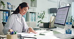 Computer, woman and doctor with documents in clinic for research on diagnosis or treatment. Technology, medical service and female healthcare worker with paperwork for notes in hospital office.