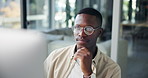 Black man, glasses and reading at computer for business, email networking or review article in office. Creative writer, SEO or thinking with tech for news information, latest trends or proofreading