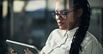 Business, woman and reading on tablet in office to review email, finance report and approve proposal. African female person, window or digital for research, schedule update and feedback of investment