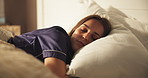 Sleeping, relax and woman on bed with peace, calm and dreaming in bedroom with pillow in apartment. Nap, tired and cozy rest on mattress with fatigue, morning comfort and weekend break in house