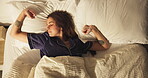 Wake up, above and woman on bed with stretching, calm and dreaming in bedroom with pillow in apartment. Sleep, relax and cozy rest on mattress with tired, morning peace and weekend break in house
