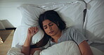 Above, woman and restless sleep in bed with nightmare, tired or fatigue with fright at home. Scared, fear and female person in bedroom asleep with bad dream, wake up or frown with sleepless problem
