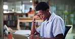Man, student and sleep by laptop at college, library or tired for assessment, project or education. African person, fatigue and burnout by computer with writing, notes or study for test at university