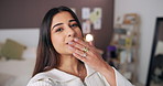 Woman, face and blow kiss with live stream in home with love for audience, chat and post in bedroom. Girl, influencer and smile with wave, hello and content creation for social media at apartment