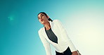 Running, blue sky and woman breathe to rest after exercise, workout and training outdoor. Sports, sunshine and person with fatigue, break and recovery for fitness performance, wellness and endurance