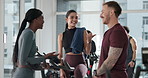 Coach, friends and laughing for people, training or body wellness for workout goal. Personal trainer, fitness discussion and funny joke for endurance challenge, gym and equipment for spin class