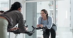 Woman, instructor and stationary bike in spin class for fitness, instructions and cardio workout. Coach, talk and people on machine for speed challenge, sports training and performance of body health