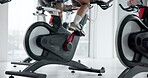 Legs, cycling and health with people in gym for training, elliptical machine and cardio. Wellness, challenge and exercise with athlete on stationery bike in sports center for energy and spin class