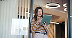 Woman, tablet and reading review with scroll, contact or check notification for night deadline in office. Creative person, tech and app with overtime, project planning or feedback at startup agency