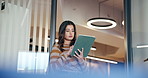 Woman, tablet and reading review in office with scroll, contact or check notification for night deadline. Creative person, tech and app with overtime, project planning or feedback at startup agency