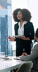 Woman, presentation and tablet in boardroom, talk and discussion for planning at finance agency. Person, speaker and business people at meeting, notes and collaboration with app for pitch at office