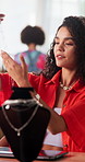 Jewelry, necklace and woman at boutique for startup, retail or store with designer order. Small business, merchandising and female jeweler with accessories for luxury brand at supplier in office.