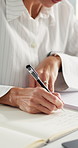 Reference, woman and hands of doctor writing in office for planning, report and healthcare study. Research, learning and surgeon with notebook closeup for paperwork, medical info and prescription