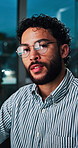 Business, face and man in office at night for data analysis, market research or investment report. Reflection, analyst and happy at workplace for company revenue statistics, budget review or overtime