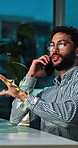 Businessman, night and phone call with discussion for proposal, negotiation or ideas at office desk. Man, employee or financial advisor talking in late evening for conversation or chat at workplace
