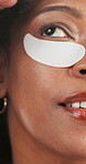 Glow, skincare and woman with eye patch, facial treatment or hydration of skin, wellness and beauty. Anti aging, cosmetics and dermatology for black person with mask, self care and hyaluronic acid