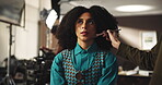 Creative, film or styling with actress getting ready for media production or video behind the scenes. Makeup, preparation or talent with stylist and woman on set in studio for advertising shoot