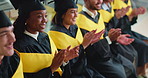 Students, graduation and applause with smile in row for education, achievement and goals at college. People, happy and success with scholarship, cheers or cap for celebration ceremony at university