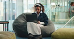 Laptop, headphones and music with woman in college for study playlist, streaming or elearning. University podcast, research and listening with person on campus for digital, dance and student platform