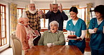 Surprise, senior woman and birthday in nursing home with celebration, clapping or confetti. Shock, retirement and cake for special event, social gathering and party with happy friends or medical team