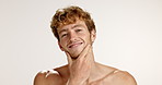 Beauty, beard and smile with face of man in studio for facial hair, grooming and skincare. Cosmetics, dermatology and self care with person on white background for growth, textures and wellness