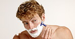 Beauty, razor or man shaving cream in studio for grooming routine, facial care or hair removal. Foam, white background or male person with space for dermatology mockup, skincare or cleaning hygiene