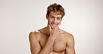 Topless, face and happy man in studio with skincare, facial treatment or anti aging routine. Space, natural or male person on white background with smile or cosmetics for glow, beauty or wellness