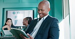 Man, tablet and happy at meeting with finance, charts and scroll with app at investment agency. Person, broker and click with fintech, boardroom and stats for graphs, results or revenue for company