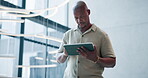 Business, black man and tablet in lobby at hotel for research, venue planning and check schedule. Thinking, male coordinator and digital for booking details, ideas and information of event management