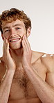 Face, cosmetics and man in studio, smile and facial hair with dermatology on white background. Portrait, person and model with beard maintenance, aesthetic and wellness with beauty, shine or skincare