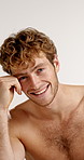 Beauty, body and face of happy man in studio for masculine health, grooming or satisfaction. Aesthetic, muscular and skincare with shirtless model on white background for cosmetics or dermatology