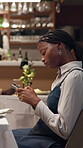 Texting, waiting and phone with woman in restaurant for online dating, late appointment and social media. Relationship app, fail connection and time with person and mobile for message and typing