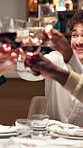 Happy man, glass and cheers with friends for champagne, celebration or fine dining in restaurant. Male person, customer or guest with group or toast for dinner, alcohol or tasting together in cafe