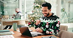 Man, laptop and excited at Christmas in office with fist pump, smile and celebration for goals. Person, happy and success with profit, revenue and bonus at xmas with computer at financial agency