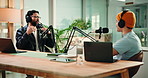 Studio, host and men with headphones for podcast, online and live streaming of interview on website. Content creation, podcaster and guest with mic for talk show, people and digital journey for radio