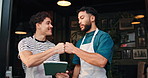 Waiter, men and fist pump with tablet at cafe, smile or review for menu, checklist or inventory. People, team and barista with motivation, tech and happy with app for results, profit or tips at diner