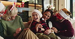 Laughing, family and happy for Christmas with social gathering, reunion and celebration on holiday. Generations, home and people for festive season with bonding, game and support for love and care