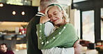 Senior couple, hug or slow dancing with love in home for christmas celebration or december holiday. Elderly, man and woman with smile or embrace in comfort for romance, festive or retirement in house