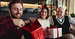Happy family, open or man with present for Christmas, support or festive celebration in home. Care, dad or woman giving gift box with gratitude, senior parent or smile for love or holiday tradition